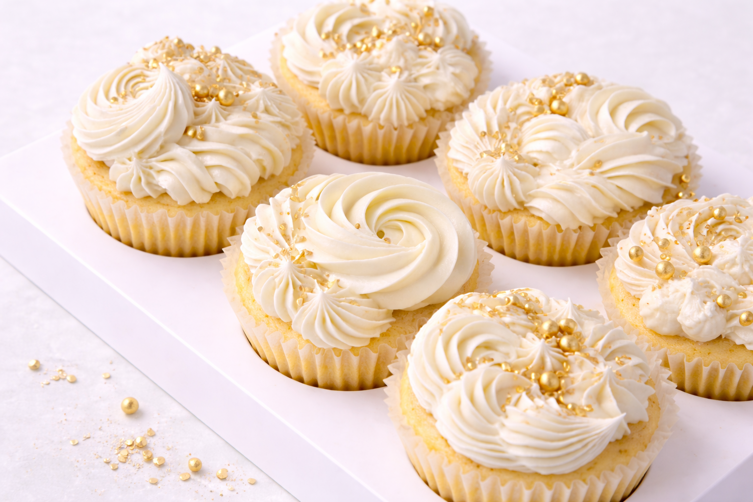 White & gold cupcakes