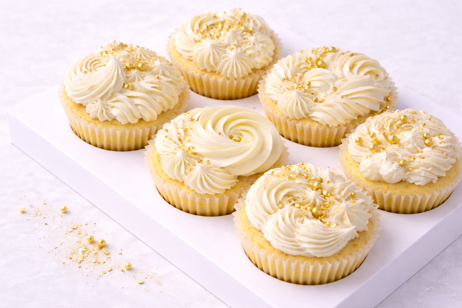 White & gold cupcakes